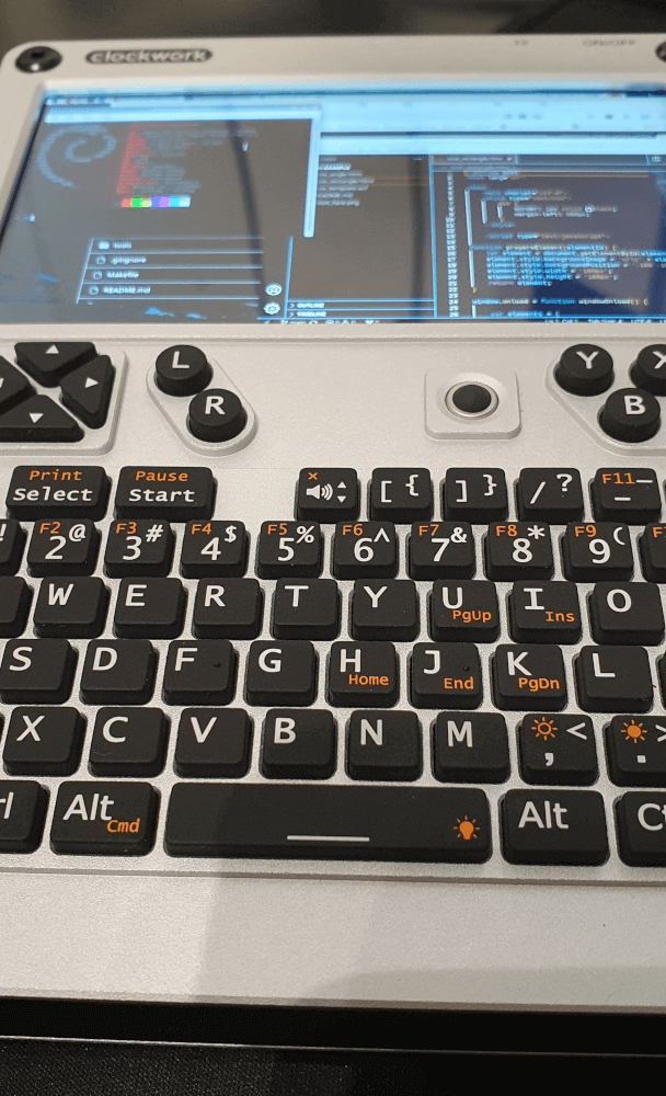 A close up of the Clockwork Pi uConsole. Showing the keyboard and screen in actionn.